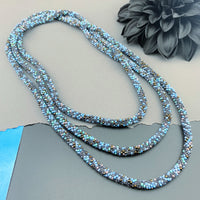 75" Abstract Pattern Beaded Crochet Rope Necklace - Shimmering Black/Blue
