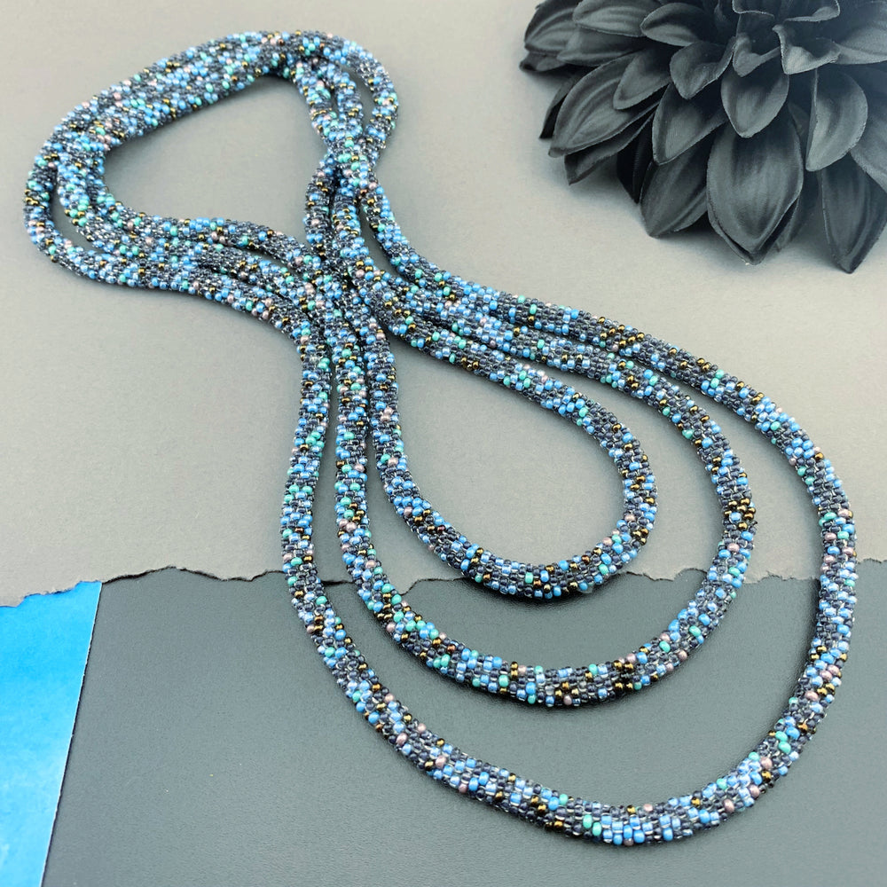 75" Abstract Pattern Beaded Crochet Rope Necklace - Shimmering Black/Blue
