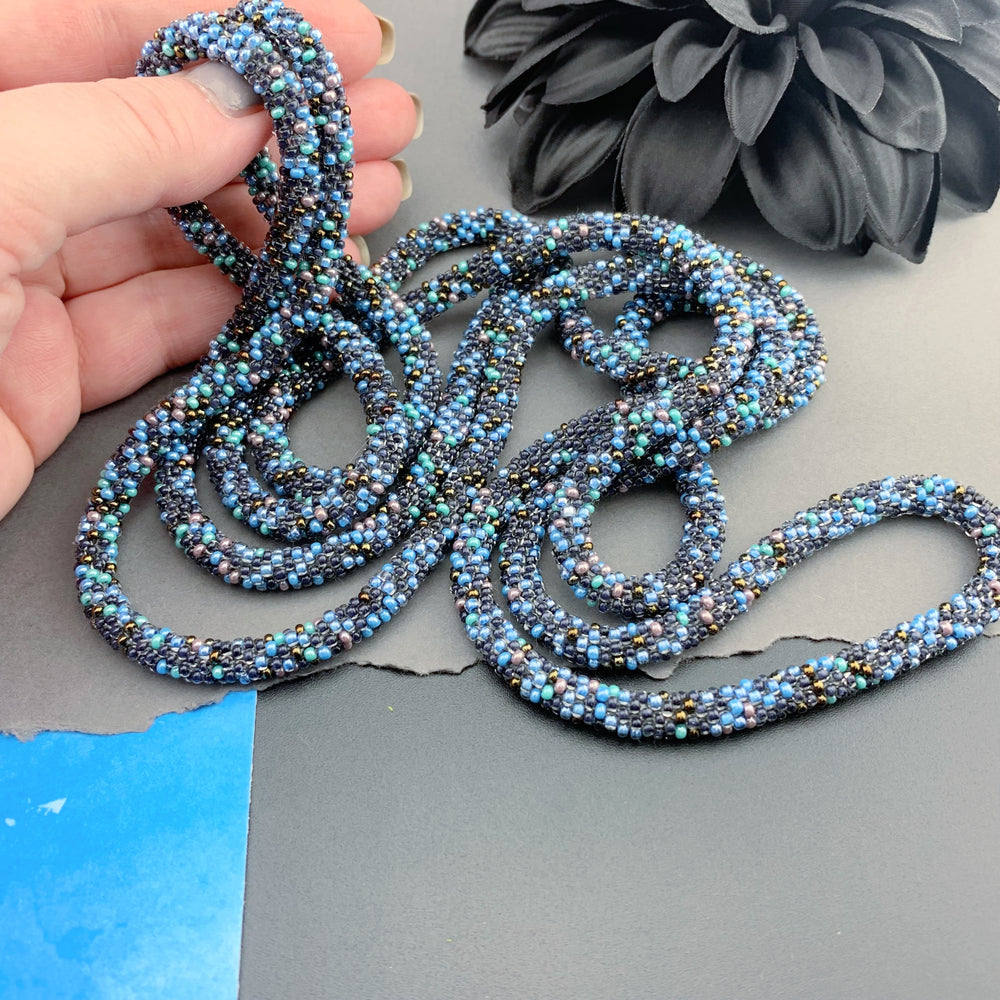 75" Abstract Pattern Beaded Crochet Rope Necklace - Shimmering Black/Blue