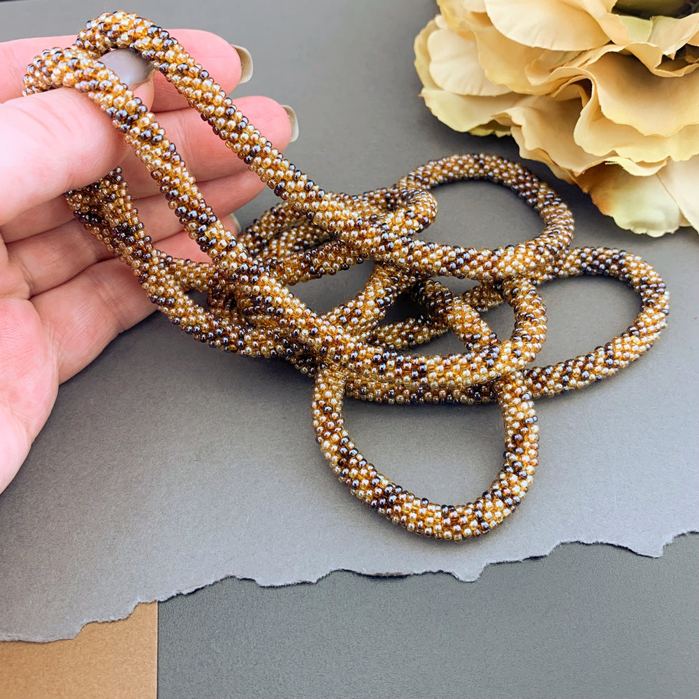 50" Abstract Pattern Beaded Crochet Rope Necklace - Shimmering Topaz Browns