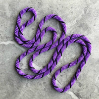 long continuous beaded crochet rope necklace in purple and black