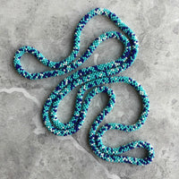 long continuous beaded crochet rope necklace in turquoise, white and blue