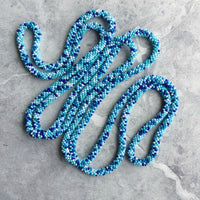 long continuous beaded crochet rope necklace in turquoise, blue and white