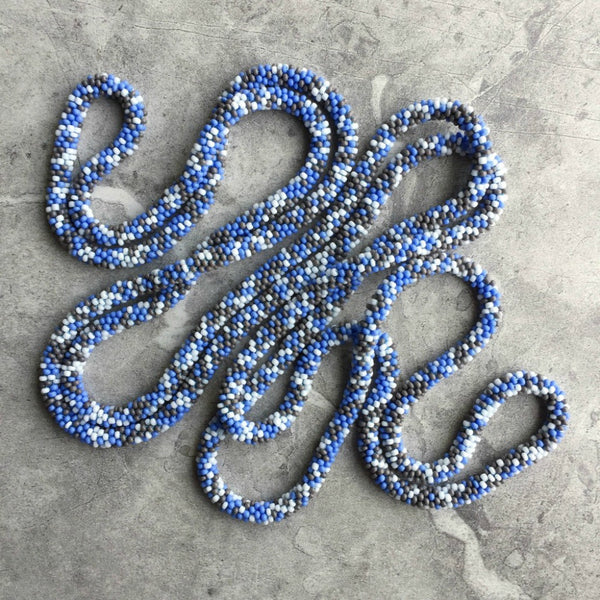 long continuous beaded crochet rope necklace in blue, grey and white